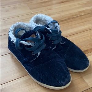 Tom’s youth high top shoes.